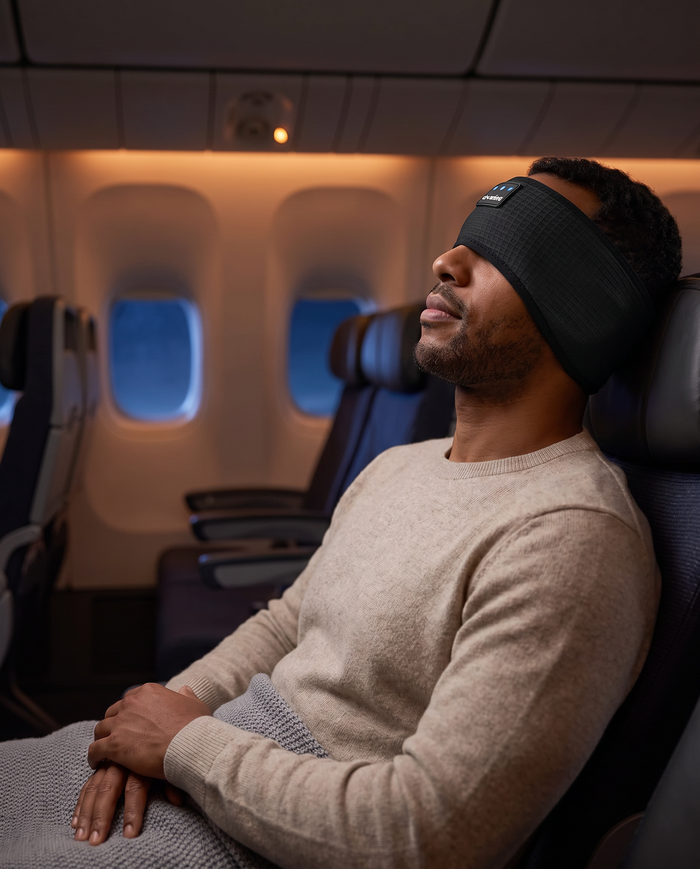 Lullwave Band used as a sleep mask on a flight